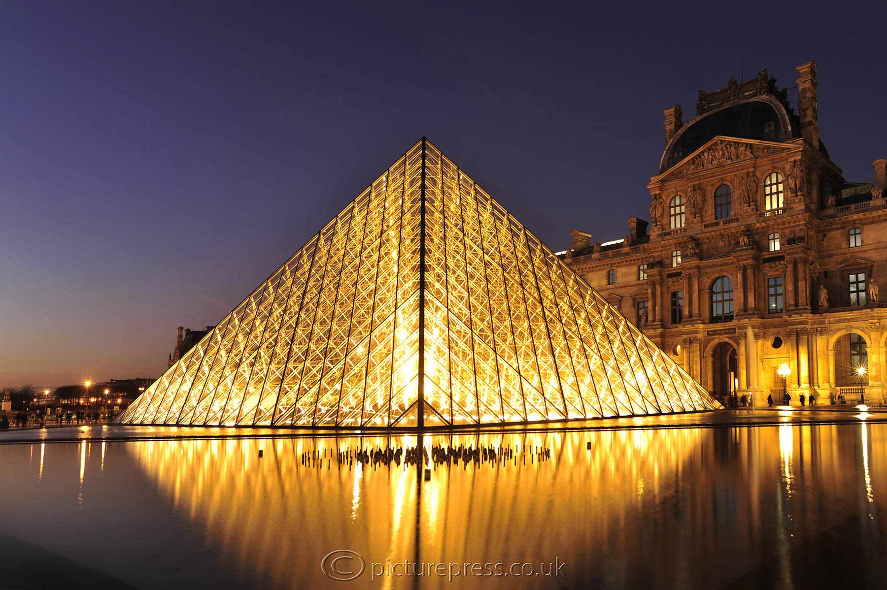 louvre Paris at dusk. photo taken for image library by mike kelly photographer picturepress