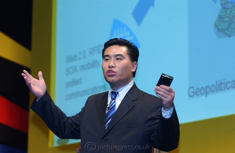 presenter on  stage at SAP conference in London